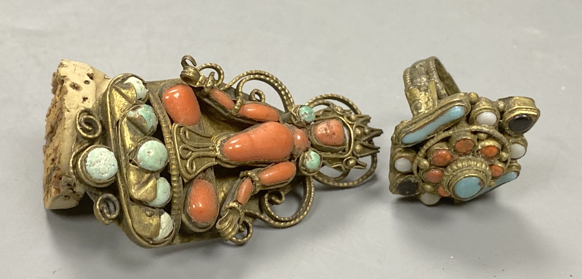 A Tibetan gilt metal,, coral & turquoise mounted brooch and ring